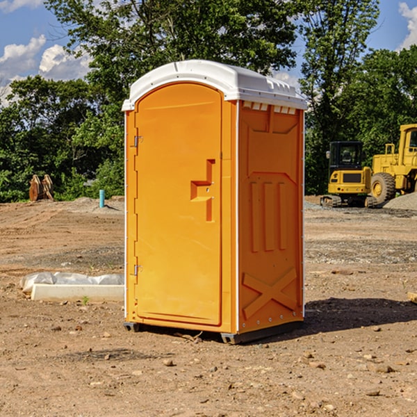 what is the cost difference between standard and deluxe porta potty rentals in Russell Georgia